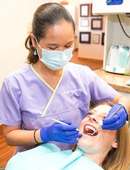 Dr. Nguyen examining patient’s mouth